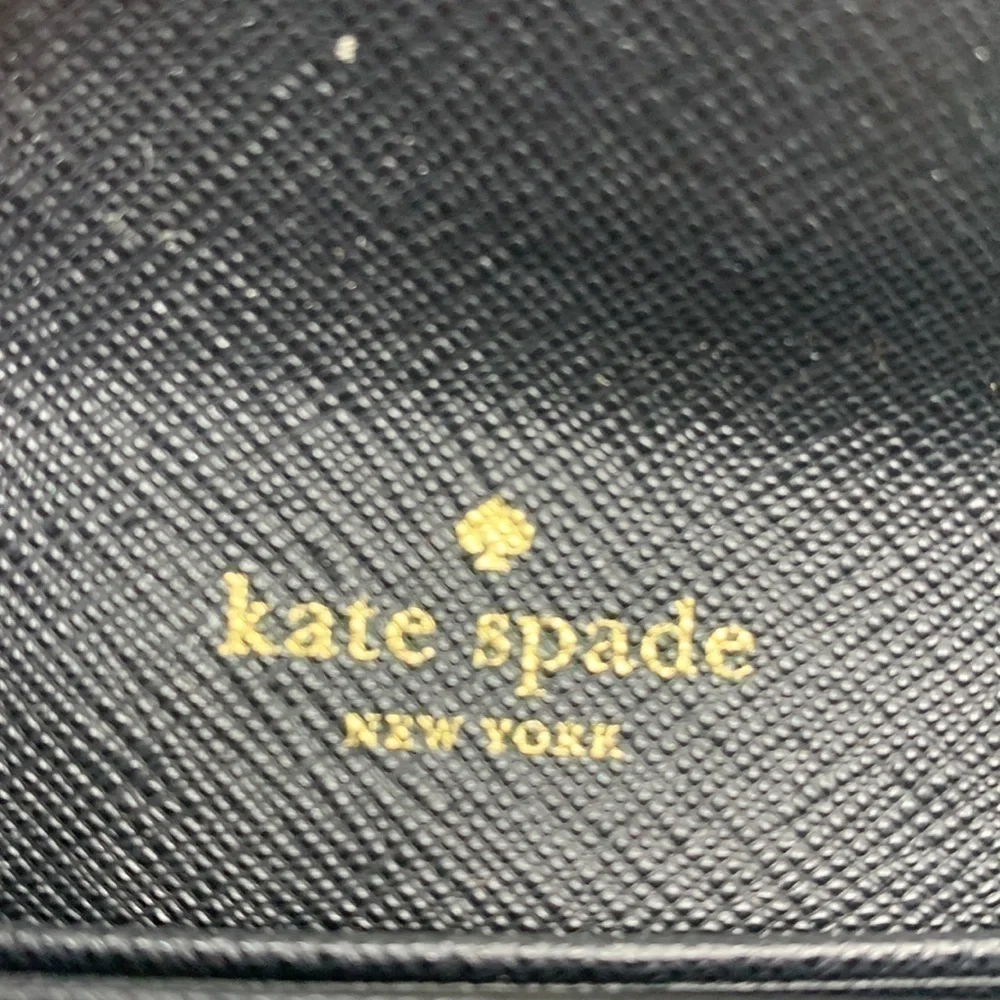 Kate Spade New York Laurel Way Petty in Black